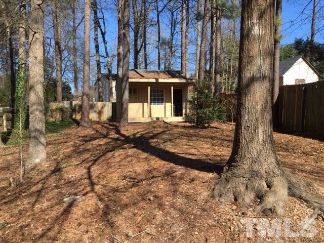 5109 Dice Drive Raleigh, NC 27616 - Photo 7 of 22 a view of a yard with large tree