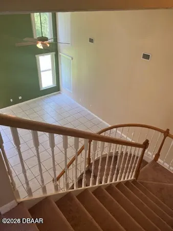 a view of staircase with window
