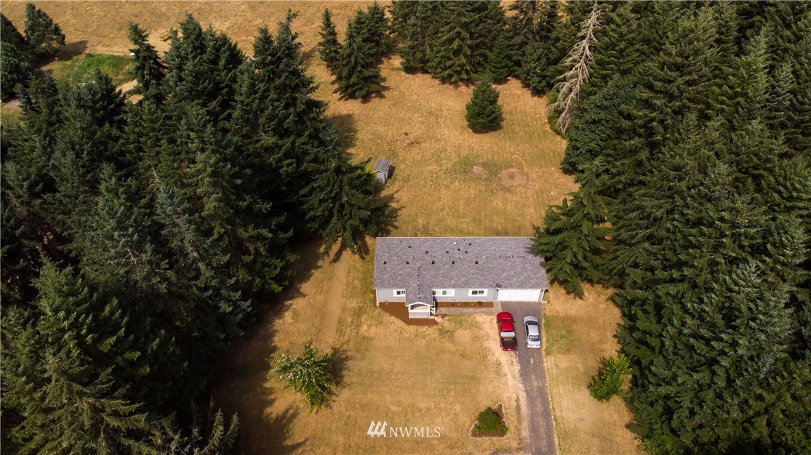 289 Antrim Road Winlock, WA 98596 - Photo 6 of 30 a view of a house with a yard