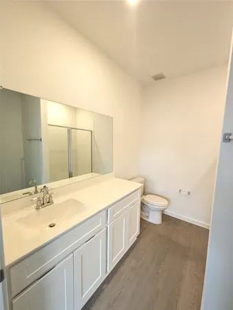 a bathroom with a sink and a toilet