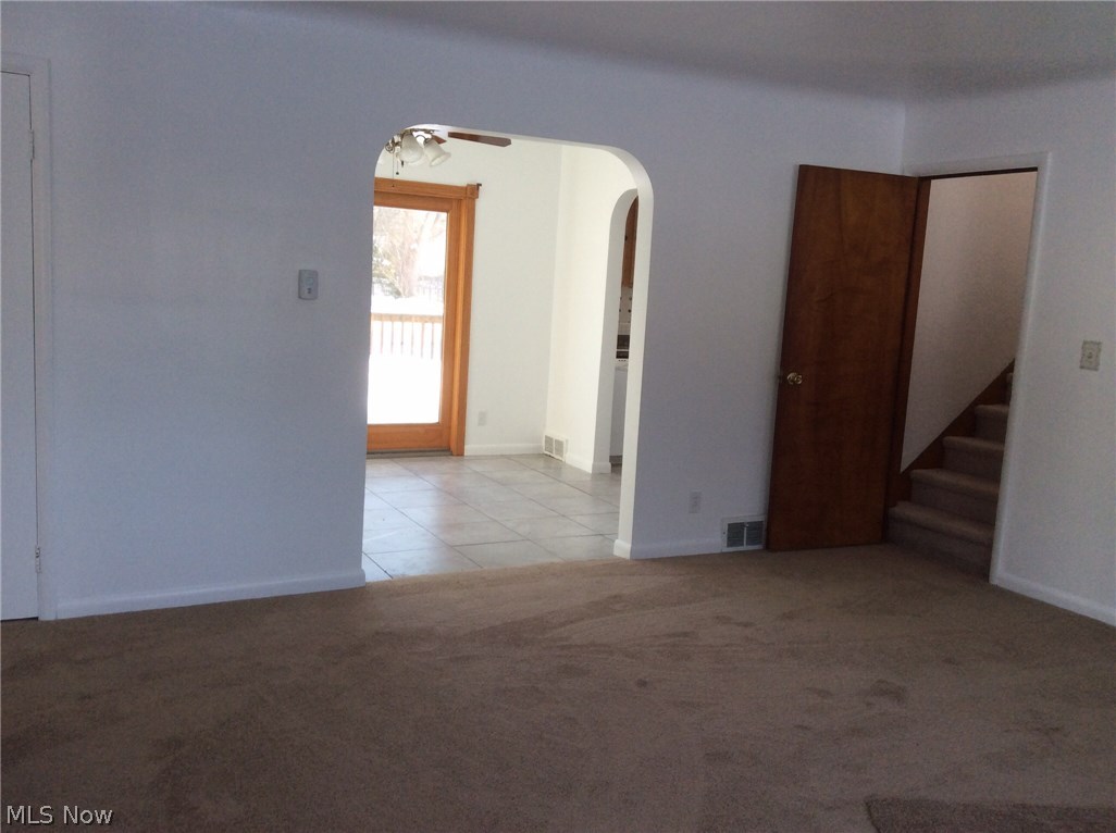 New living room carpet, new tile, new paint throughout