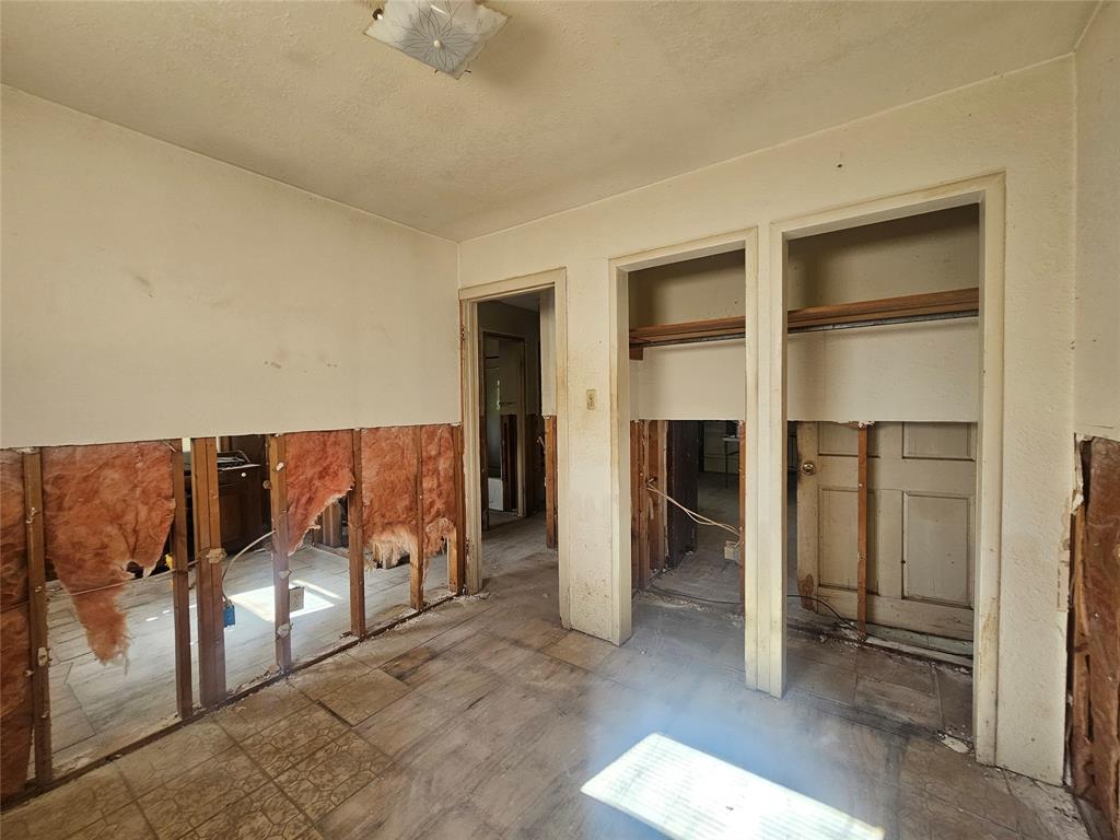 1008 Sixth Street Bangs, TX 76823 - Photo 7 of 24 a view of a livingroom with furniture and a ceiling fan
