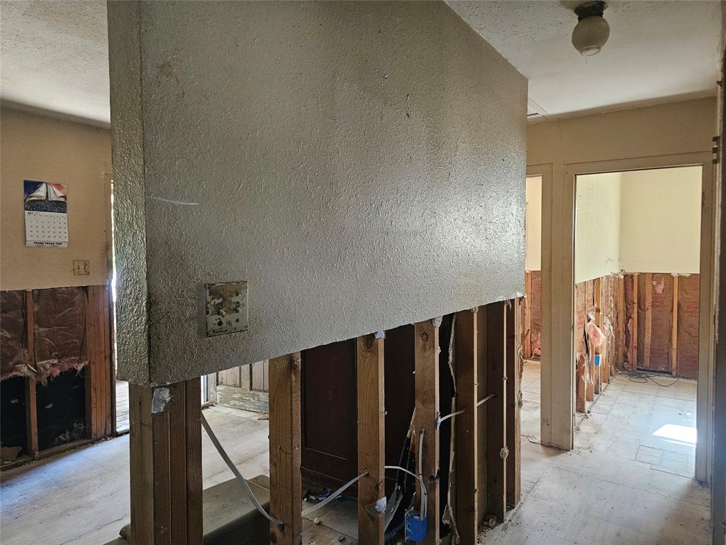1008 Sixth Street Bangs, TX 76823 - Photo 10 of 24 a view of walk in closet with clothes and shoes