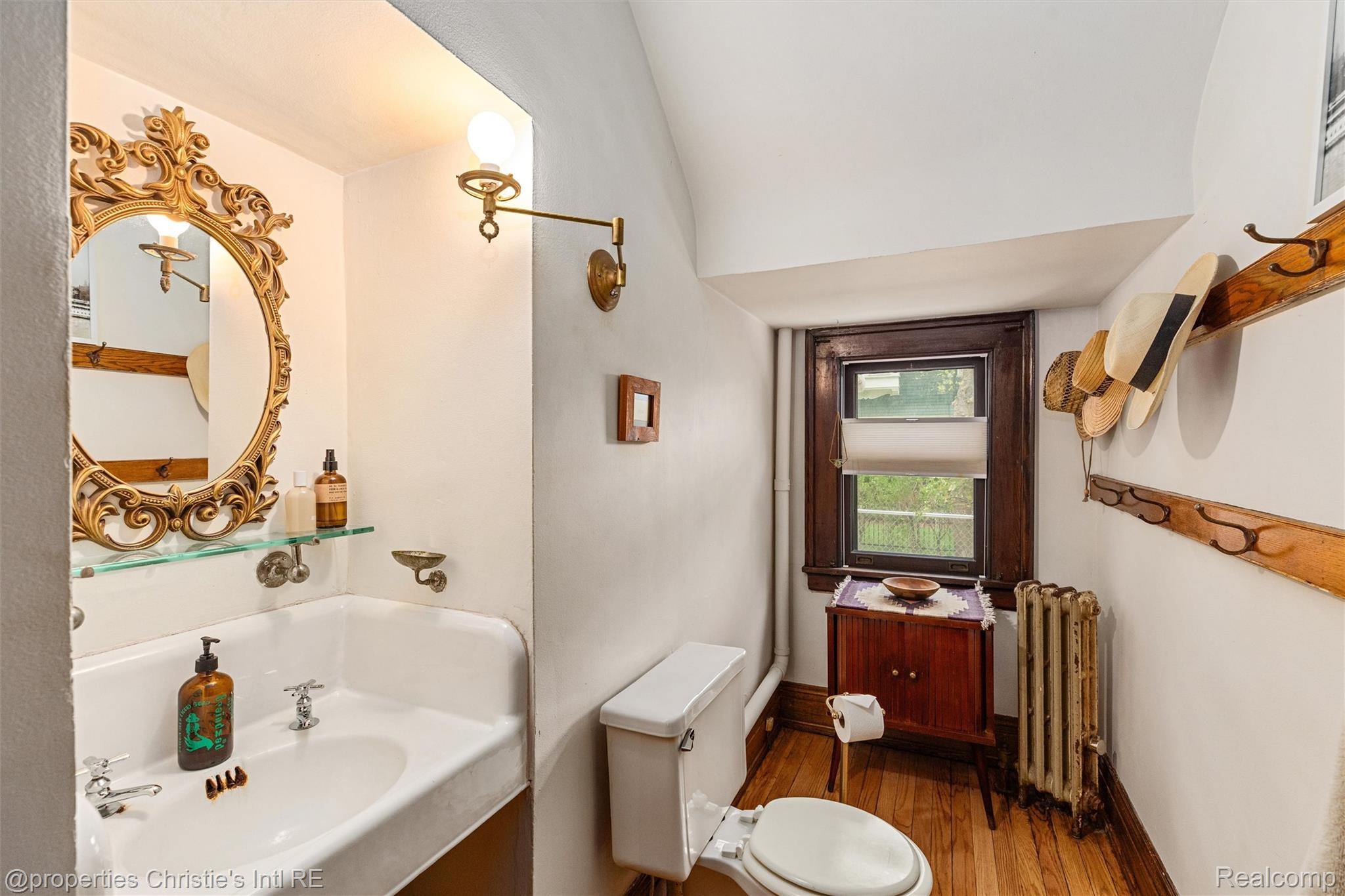 36 Longfellow Street Detroit, MI 48202 - Photo 32 of 81 Bathroom featuring wood finished floors, radiator, and vanity