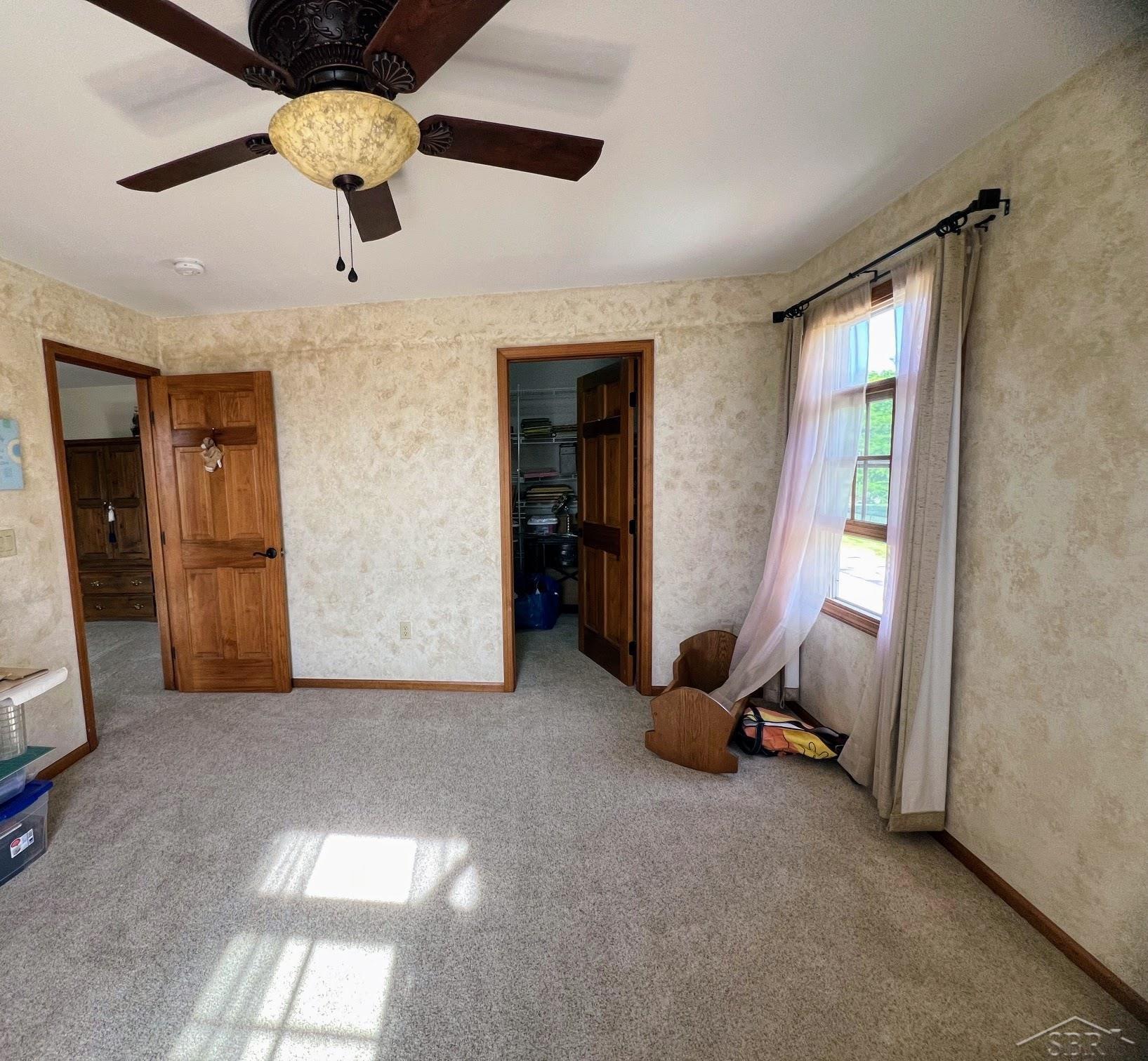 3841 Hackett Road Saginaw, MI 48603 - Photo 30 of 44 With a walk-in closet.