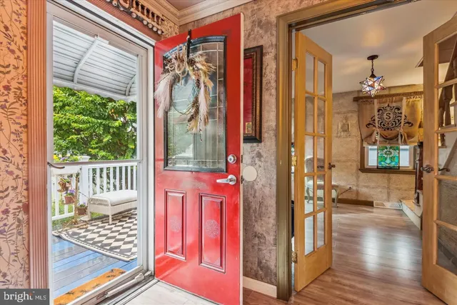 a view of a balcony and wooden floor