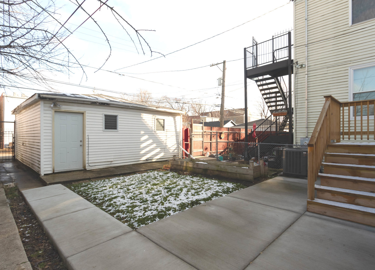 1439 North Springfield Avenue Chicago, IL 60651 - Photo 31 of 35 a view of a back yard of the house