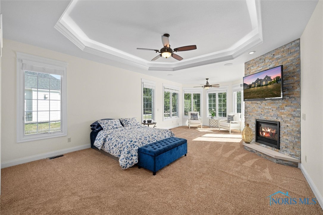 26006 Seminary Road Perrysburg, OH 43551 - Photo 17 of 40 Expansive Primary Suite with Architectural Ceiling & Gas Fireplace