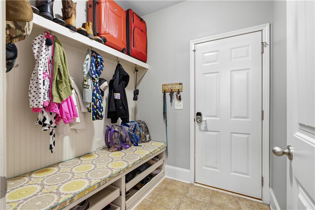 5825 Willow Oak Pass Cumming, GA 30040 - Photo 41 of 55 a view of walk in closet with clothes