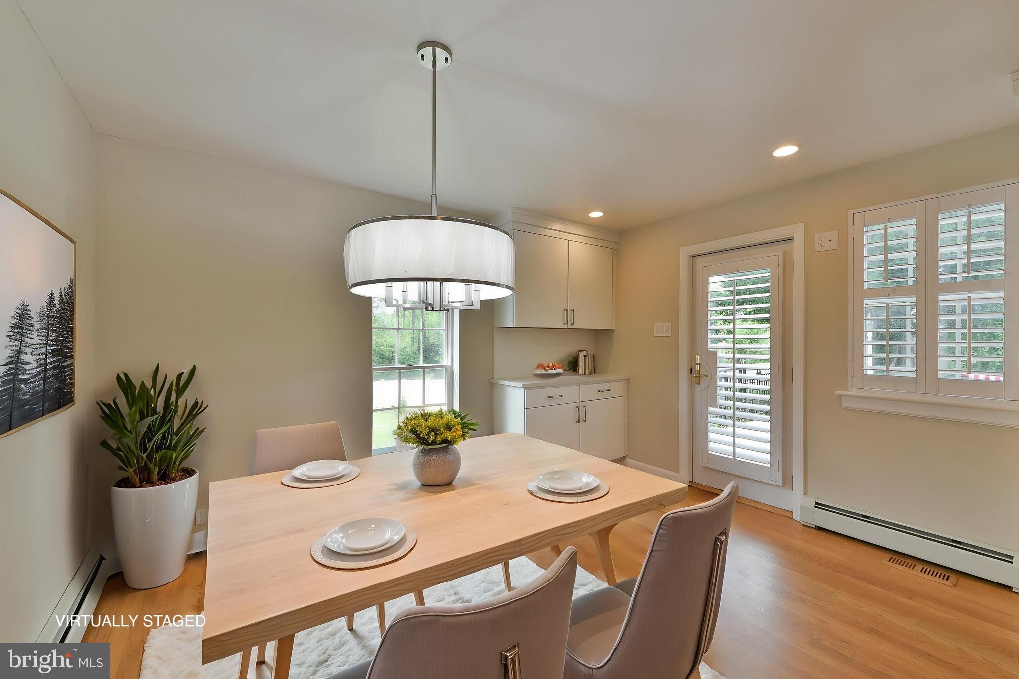 6113 West Mill Road Flourtown, PA 19031 - Photo 22 of 39 Elegant Dining with Backyard Views VSTAGED