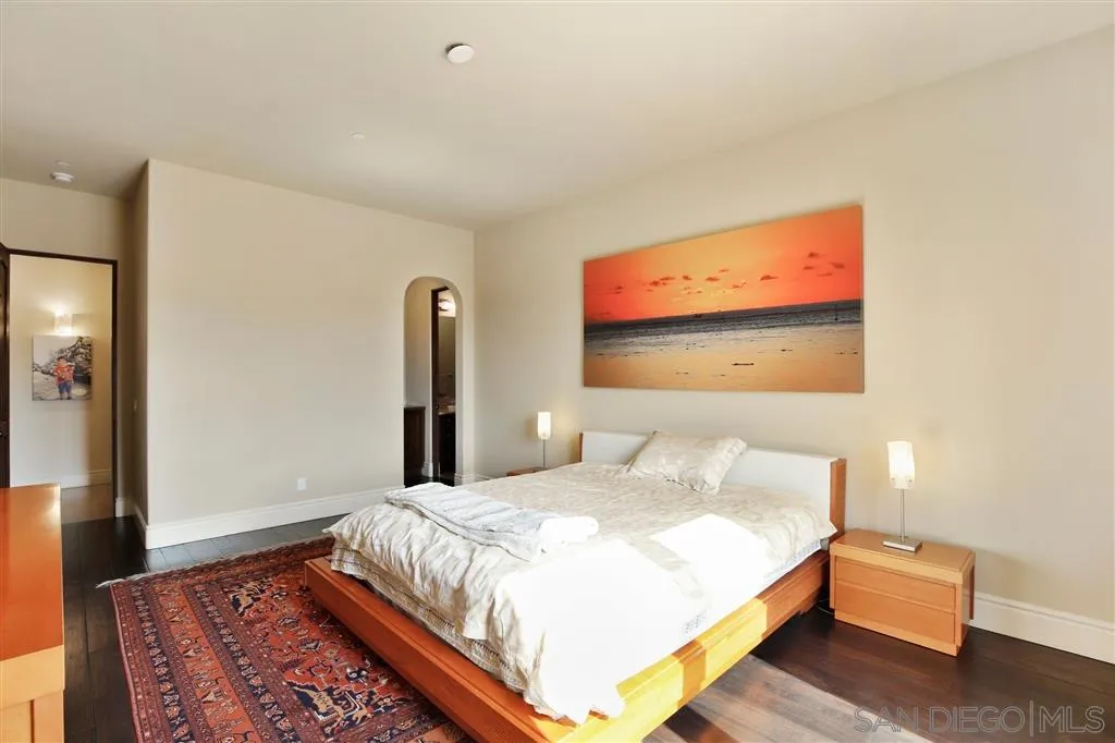 4142 Bridlewood Road Fallbrook, CA 92028 - Photo 16 of 25 a bedroom with a bed and wooden floor