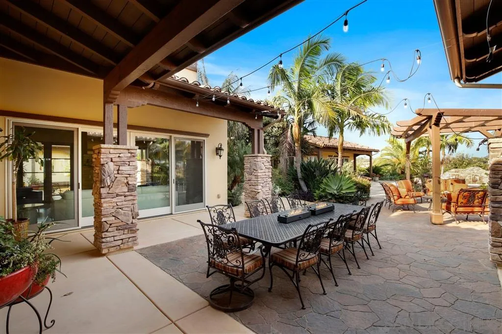 4142 Bridlewood Road Fallbrook, CA 92028 - Photo 21 of 25 a view of an outdoor dining space with a patio