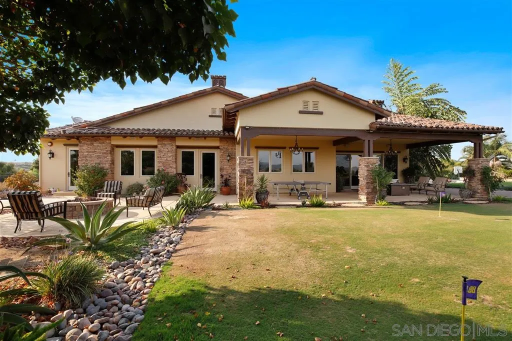 4142 Bridlewood Road Fallbrook, CA 92028 - Photo 23 of 25 a view of a house with swimming pool and porch with furniture