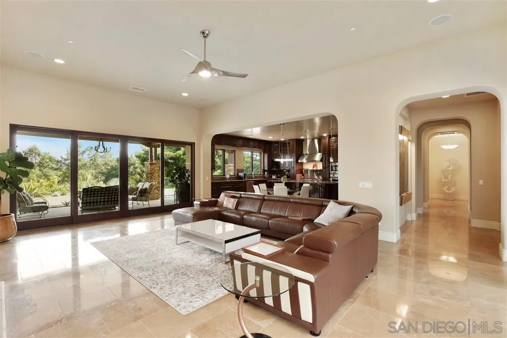 4142 Bridlewood Road Fallbrook, CA 92028 - Photo 8 of 25 a living room with furniture and large windows