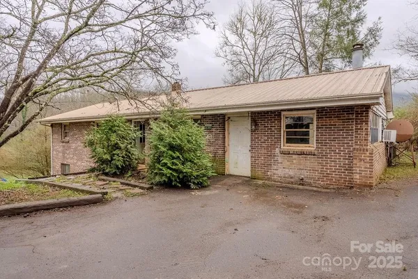 a view of a house with a garage