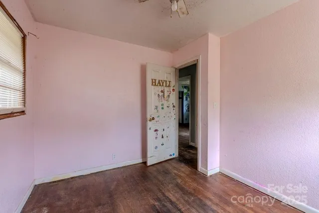 an empty room with window