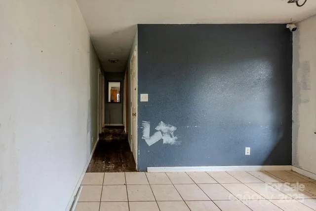 a view of a utility room with windows