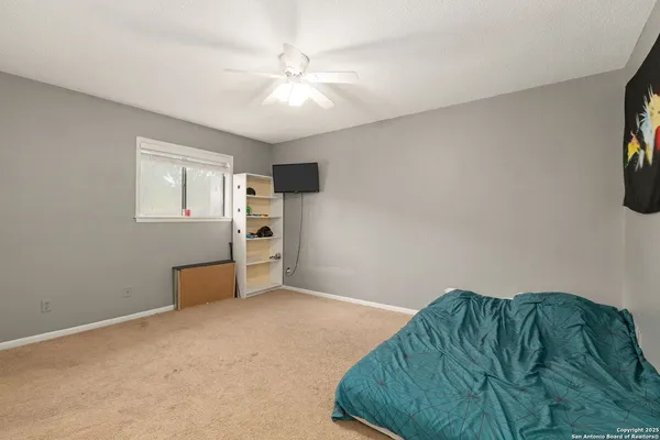 a view of a bedroom with closet area