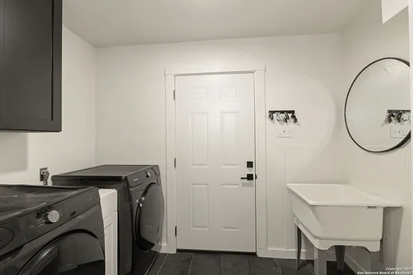 a view of a backyard with swimming pool