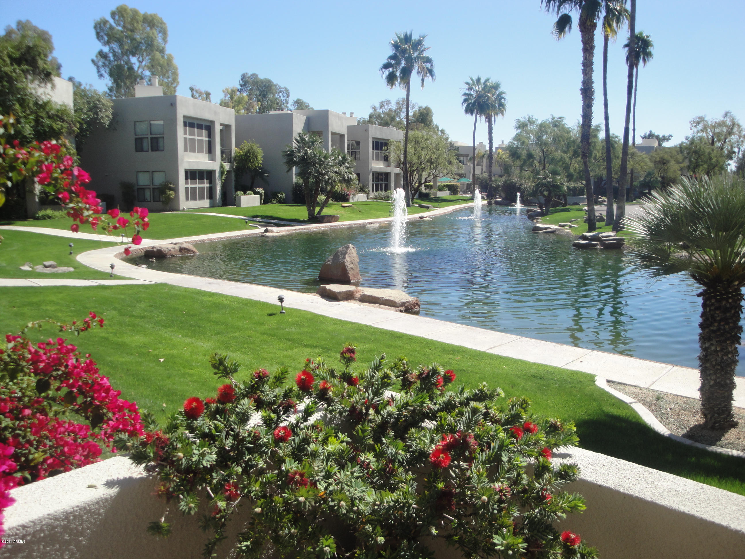 7700 East Gainey Ranch Road, Unit 123 Scottsdale, AZ 85258 - Photo 1 of 40 LAGOON VIEW FROM PATIO