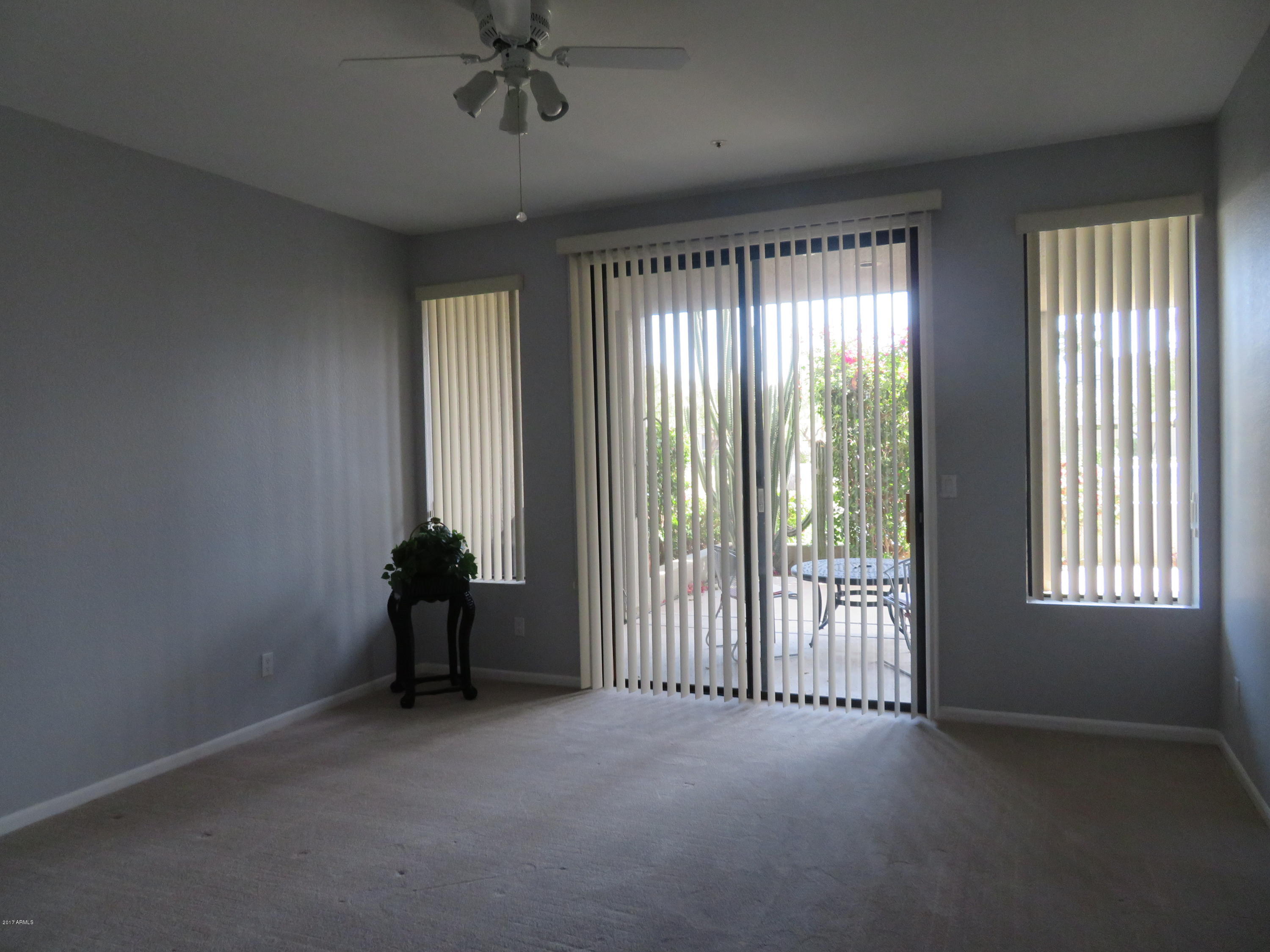 7700 East Gainey Ranch Road, Unit 123 Scottsdale, AZ 85258 - Photo 16 of 40 MASTER W ACCESS OUT TO COVERED PATIO