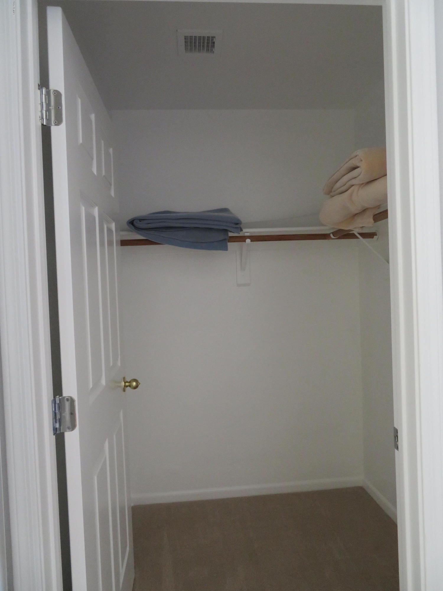 7700 East Gainey Ranch Road, Unit 123 Scottsdale, AZ 85258 - Photo 23 of 40 GUEST BEDROOM WALK IN CLOSET