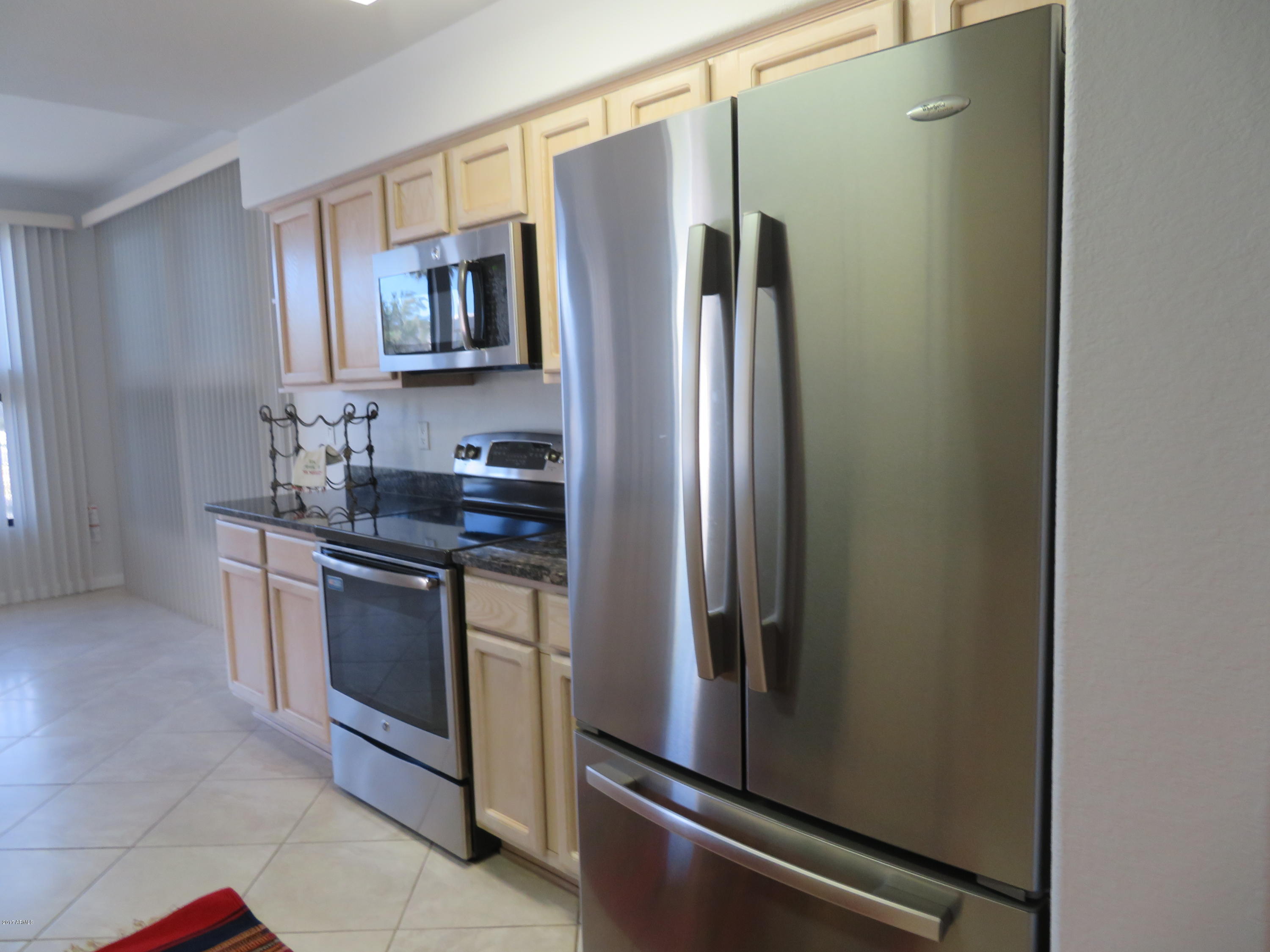 7700 East Gainey Ranch Road, Unit 123 Scottsdale, AZ 85258 - Photo 9 of 40 STAINLESS APPLIANCES