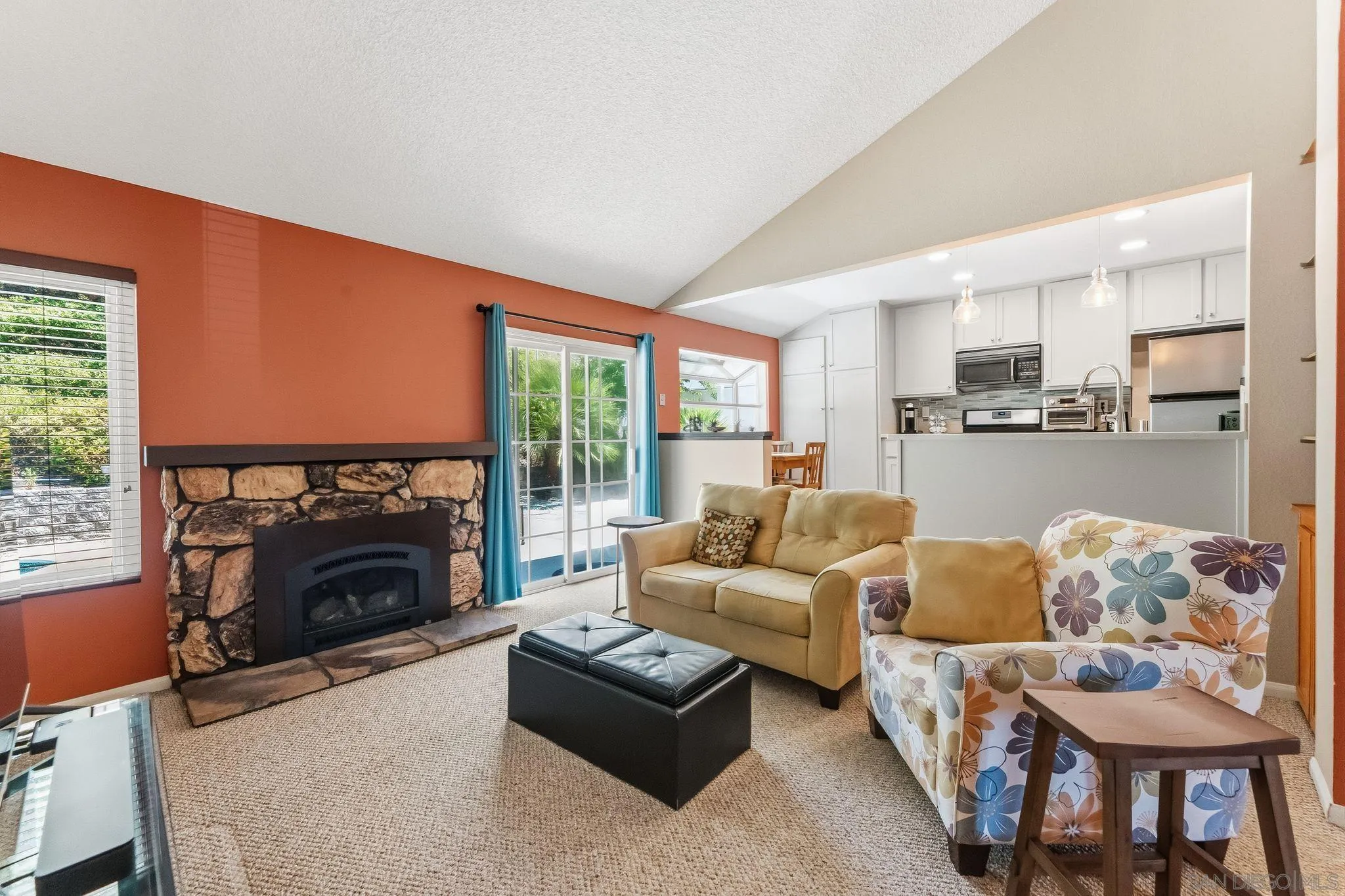 10565 Strathmore Drive Santee, CA 92071 - Photo 10 of 59 a living room with furniture and a fireplace