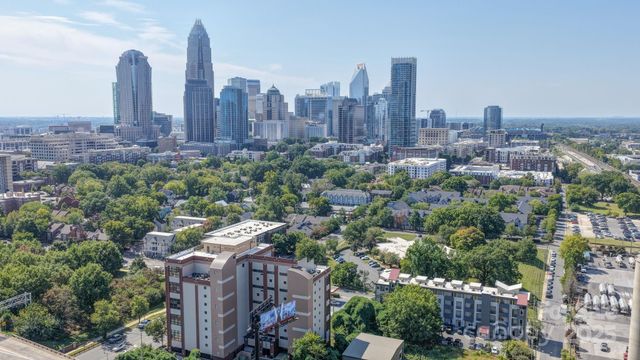 a view of a city with tall buildings