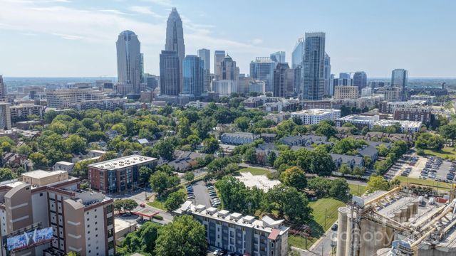 a view of a city with tall buildings