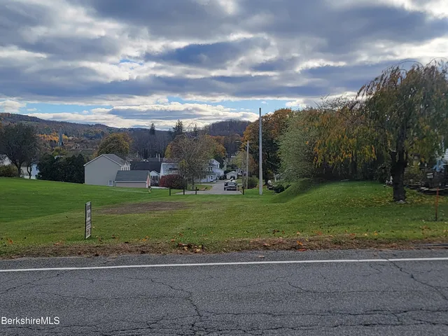 a view of a stadium that has a big yard
