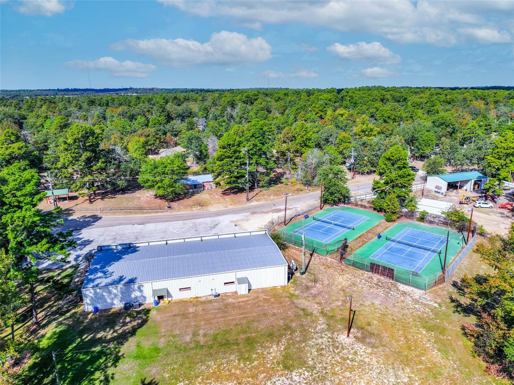 Lot 7 King Sebastian Road Scroggins, TX 75480 - Photo 30 of 40 a wooden bench sitting in the middle of a city