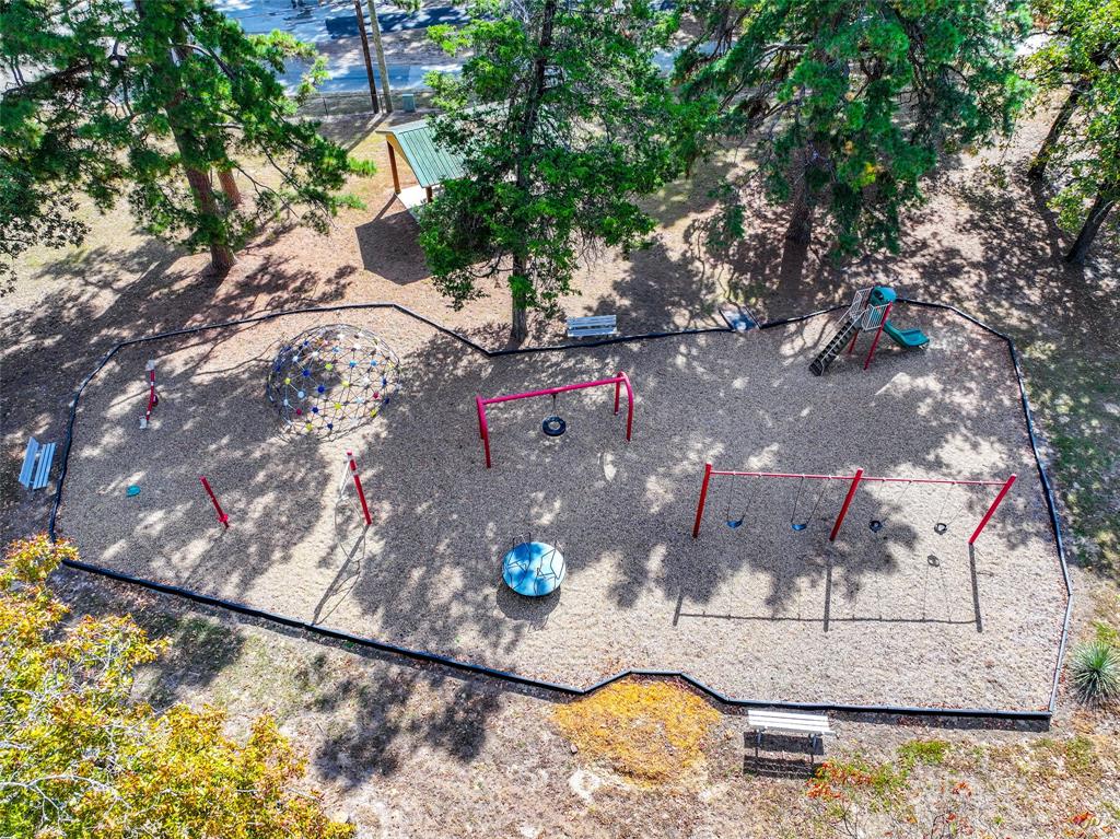 Lot 7 King Sebastian Road Scroggins, TX 75480 - Photo 32 of 40 a view of a wooden floor with a tree