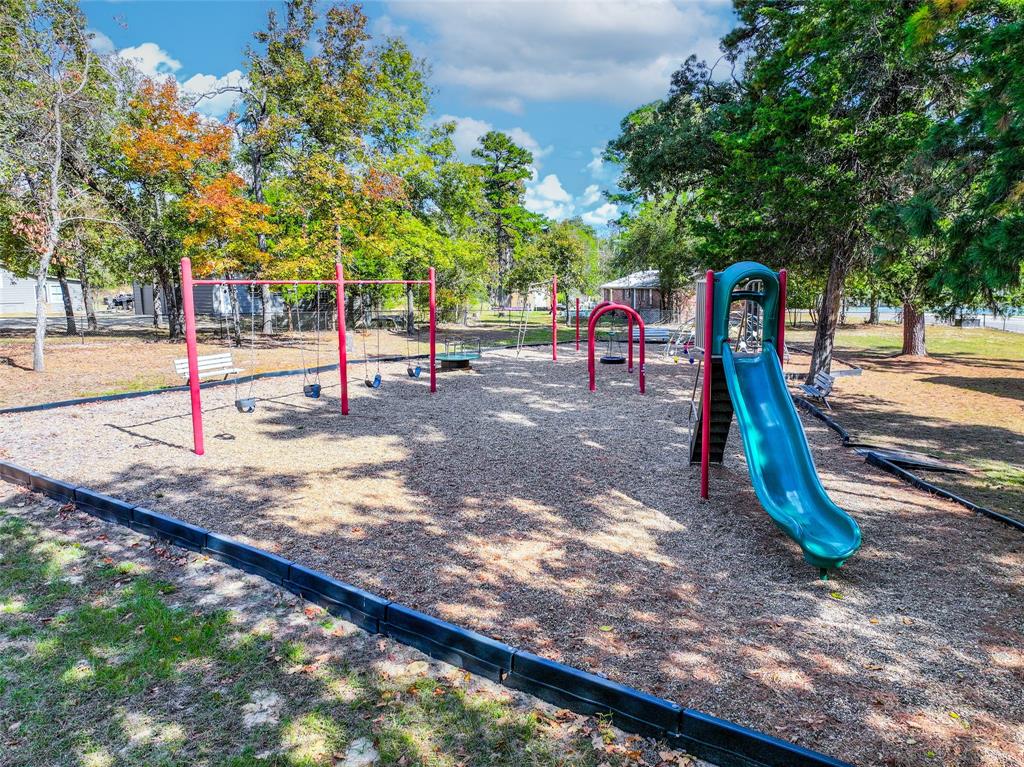 Lot 7 King Sebastian Road Scroggins, TX 75480 - Photo 33 of 40 a view of a park with slides