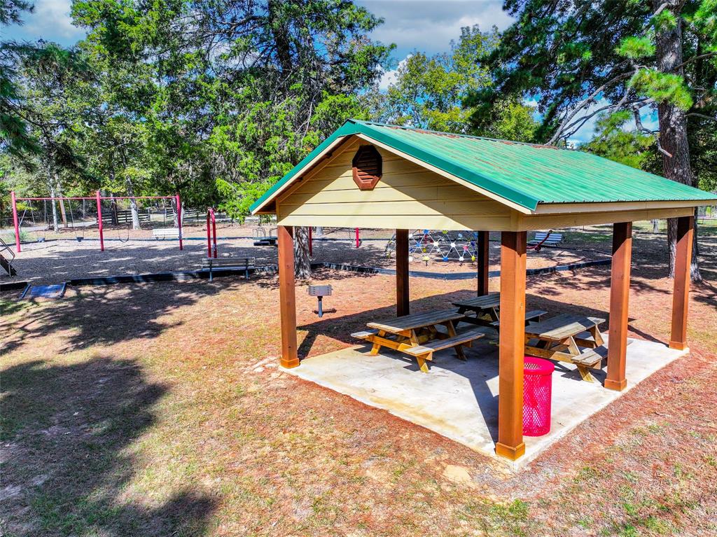 Lot 7 King Sebastian Road Scroggins, TX 75480 - Photo 34 of 40 a view of outdoor space with seating area and trees