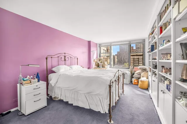 a bathroom with a sink shower and a mirror