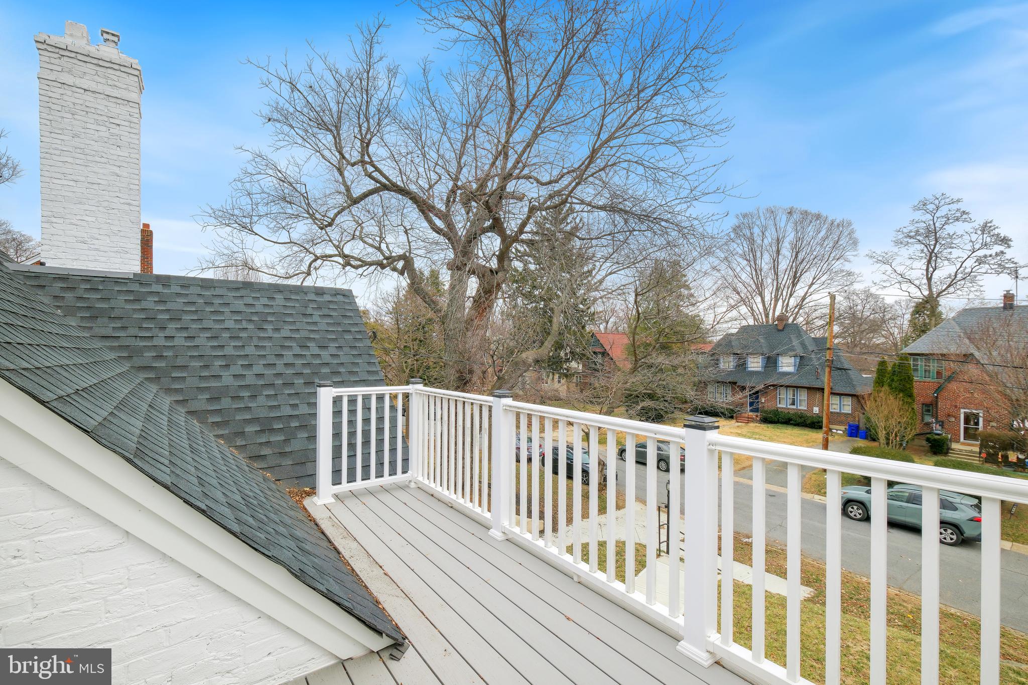 617 Greenbrier Drive Silver Spring, MD 20910 - Photo 19 of 60 a view of a balcony with wooden fence and floor
