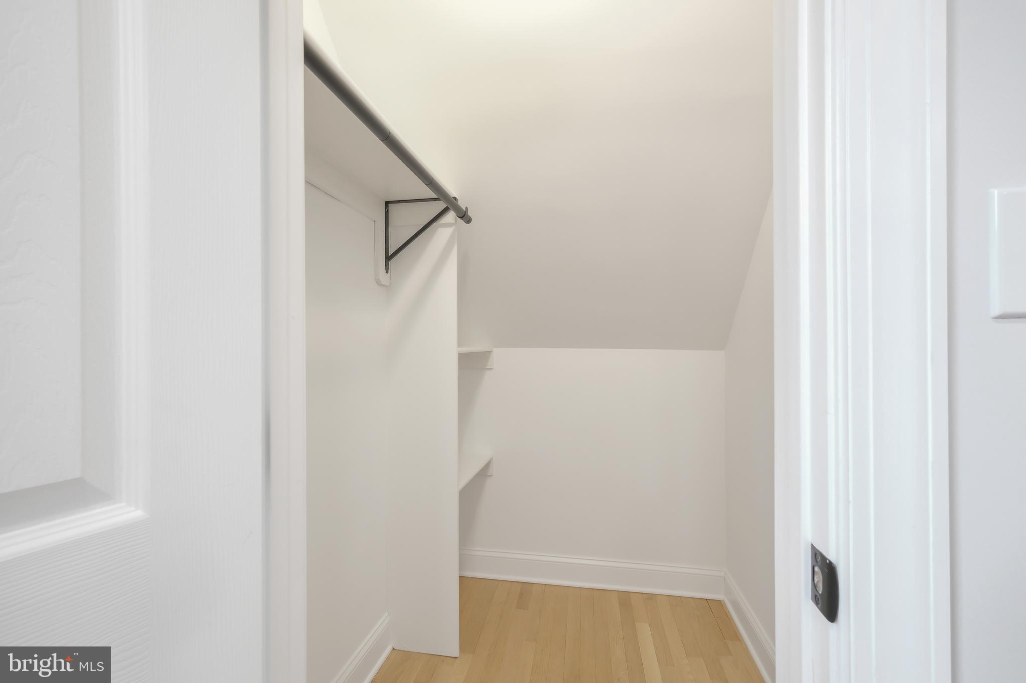 617 Greenbrier Drive Silver Spring, MD 20910 - Photo 21 of 60 a view of walk in closet with empty racks