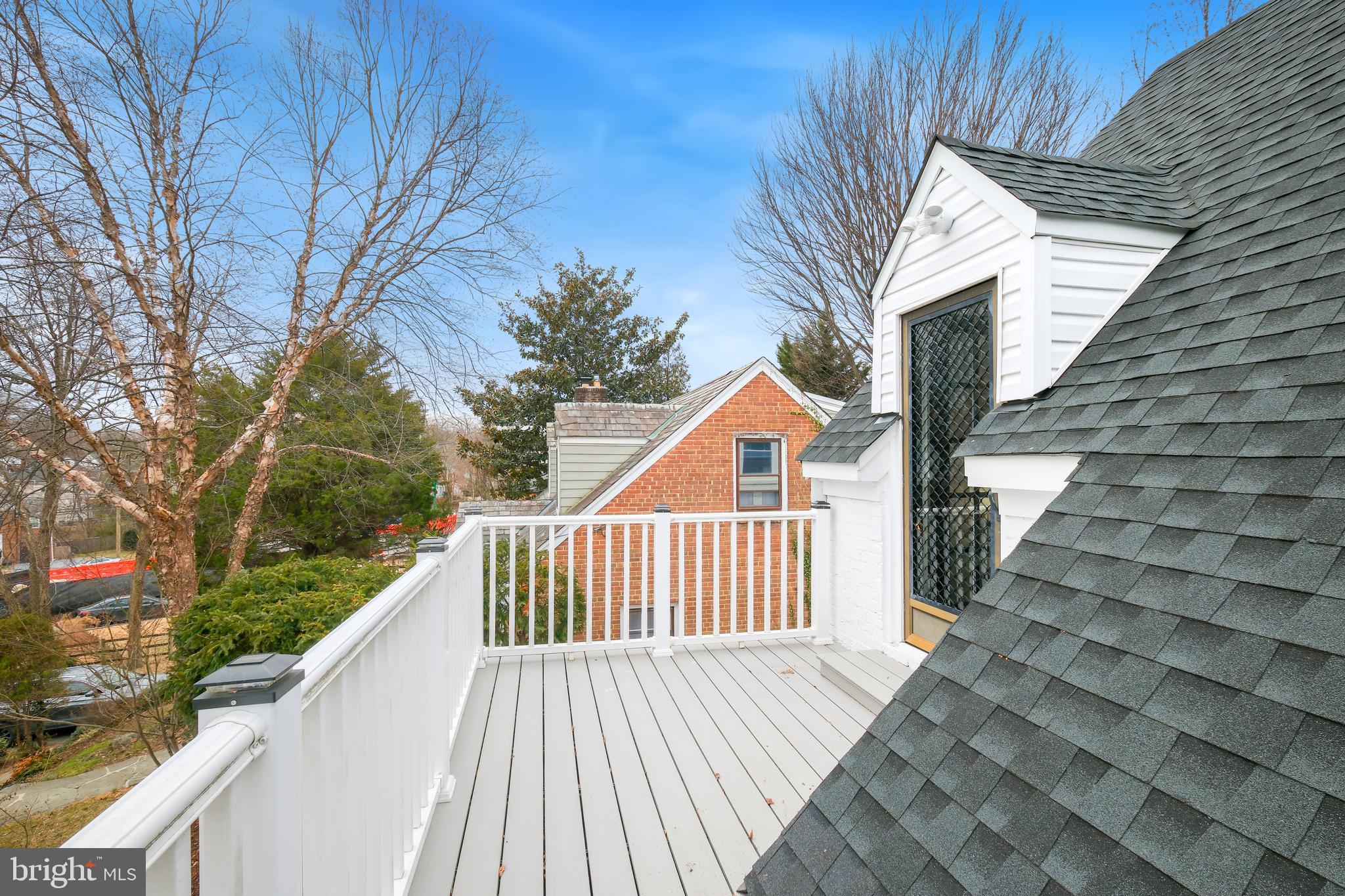 617 Greenbrier Drive Silver Spring, MD 20910 - Photo 22 of 60 a view of backyard with deck and wooden floor