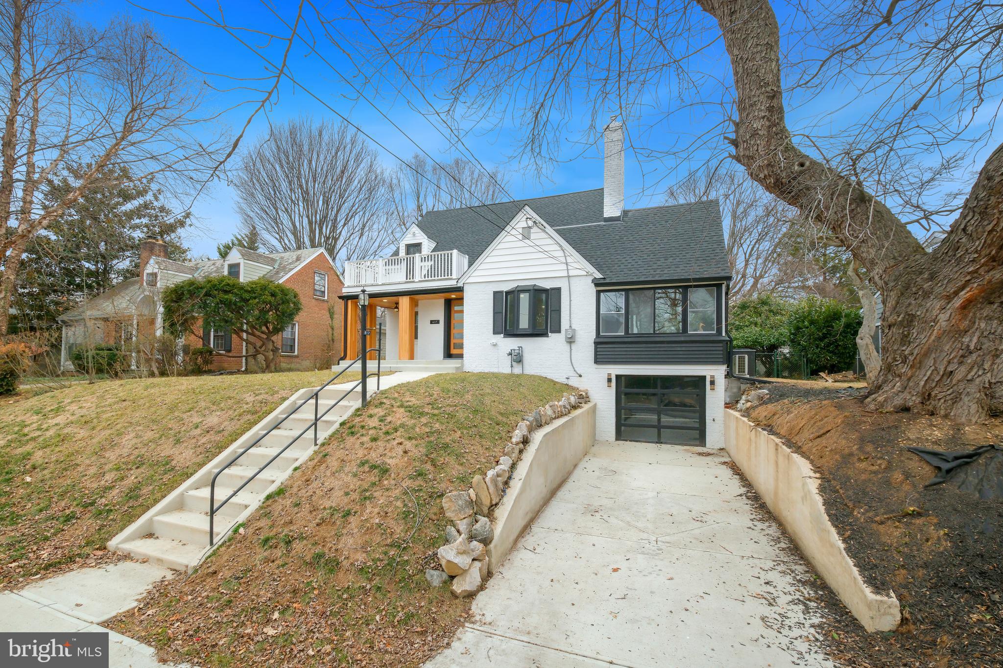617 Greenbrier Drive Silver Spring, MD 20910 - Photo 41 of 60 a front view of a house with large trees