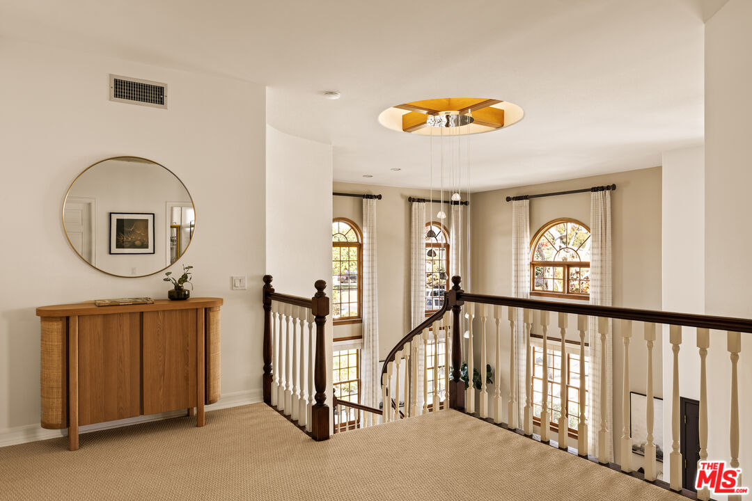 7825 Cowan Avenue Los Angeles, CA 90045 - Photo 14 of 33 a view of a hallway with a elevator