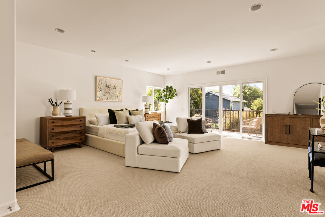 7825 Cowan Avenue Los Angeles, CA 90045 - Photo 16 of 33 a living room with furniture and a large window