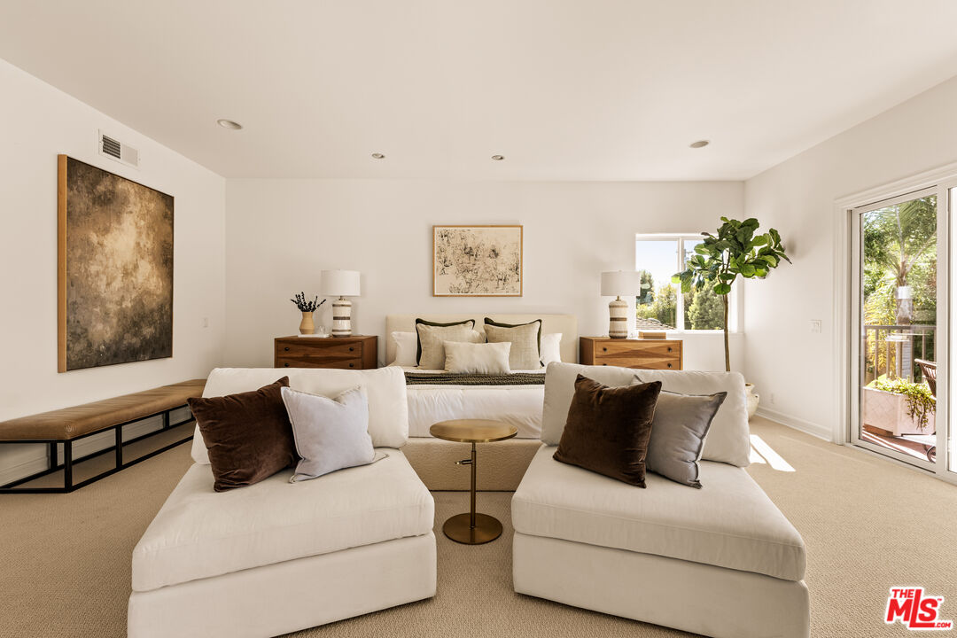7825 Cowan Avenue Los Angeles, CA 90045 - Photo 17 of 33 a living room with furniture and a large window