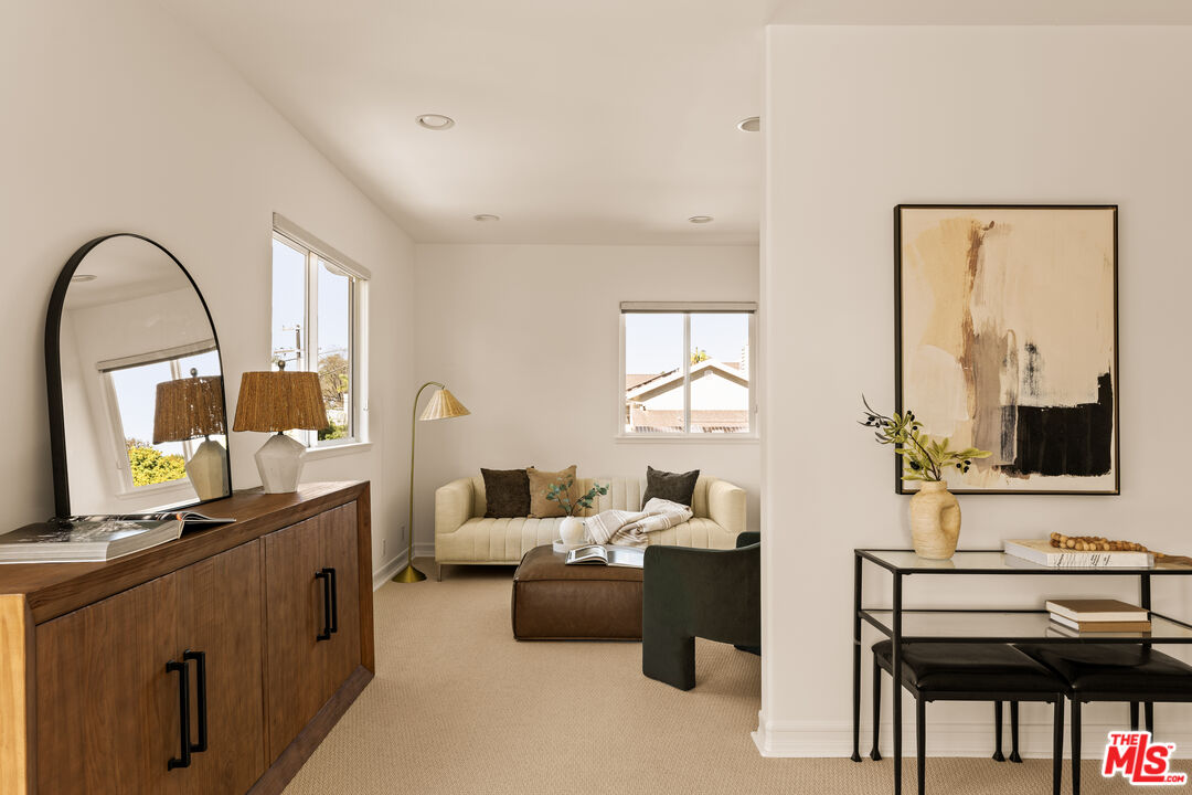7825 Cowan Avenue Los Angeles, CA 90045 - Photo 18 of 33 a living room with furniture and a window