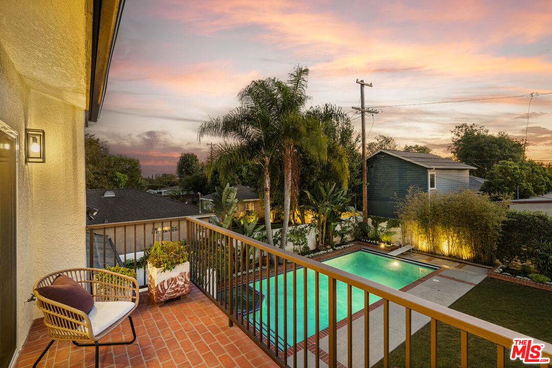 7825 Cowan Avenue Los Angeles, CA 90045 - Photo 19 of 33 a view of a chair and tables in the balcony