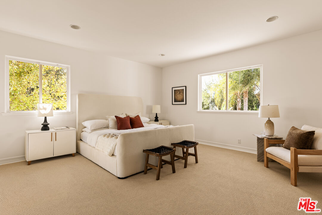 7825 Cowan Avenue Los Angeles, CA 90045 - Photo 24 of 33 a bed room with a bed and a chair