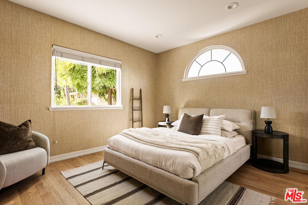 7825 Cowan Avenue Los Angeles, CA 90045 - Photo 26 of 33 a bedroom with bed and a window
