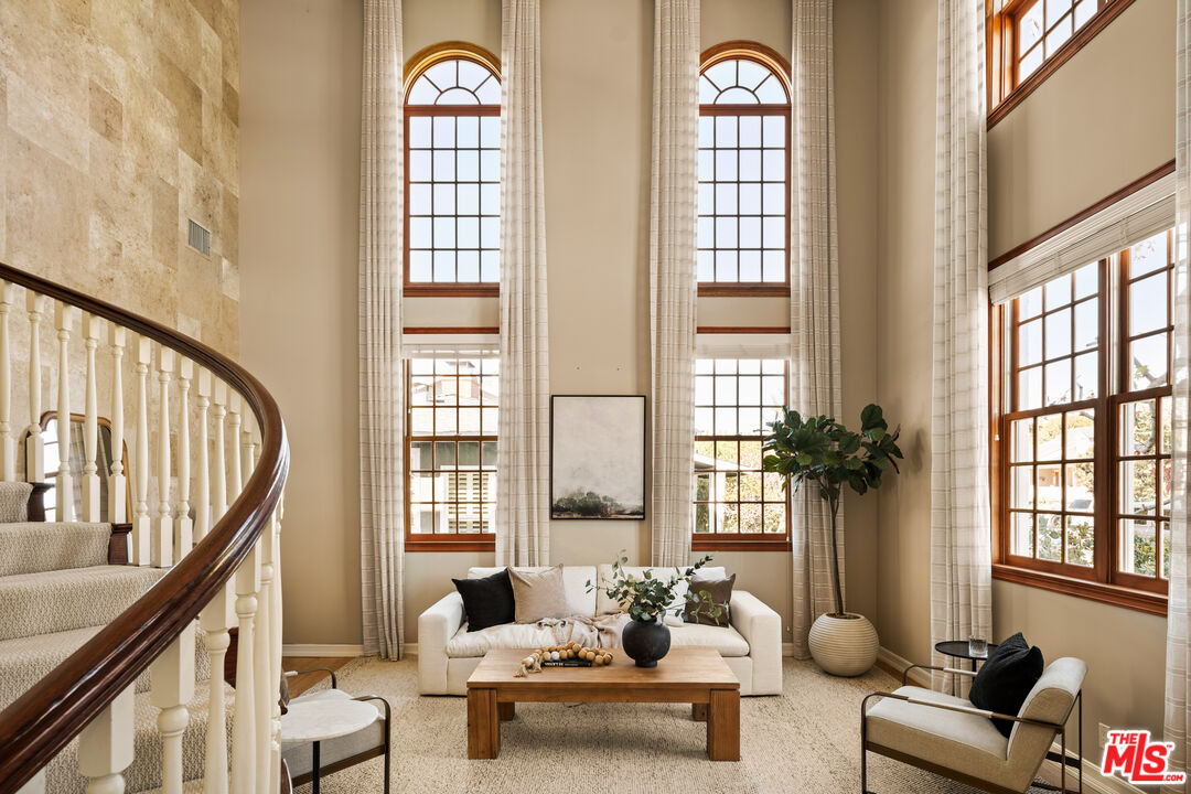 7825 Cowan Avenue Los Angeles, CA 90045 - Photo 3 of 33 a living room with furniture and a large window