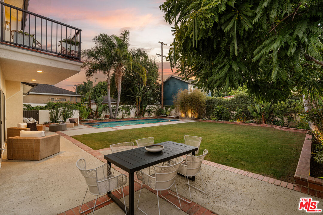 7825 Cowan Avenue Los Angeles, CA 90045 - Photo 31 of 33 a view of a swimming pool and lounge chairs