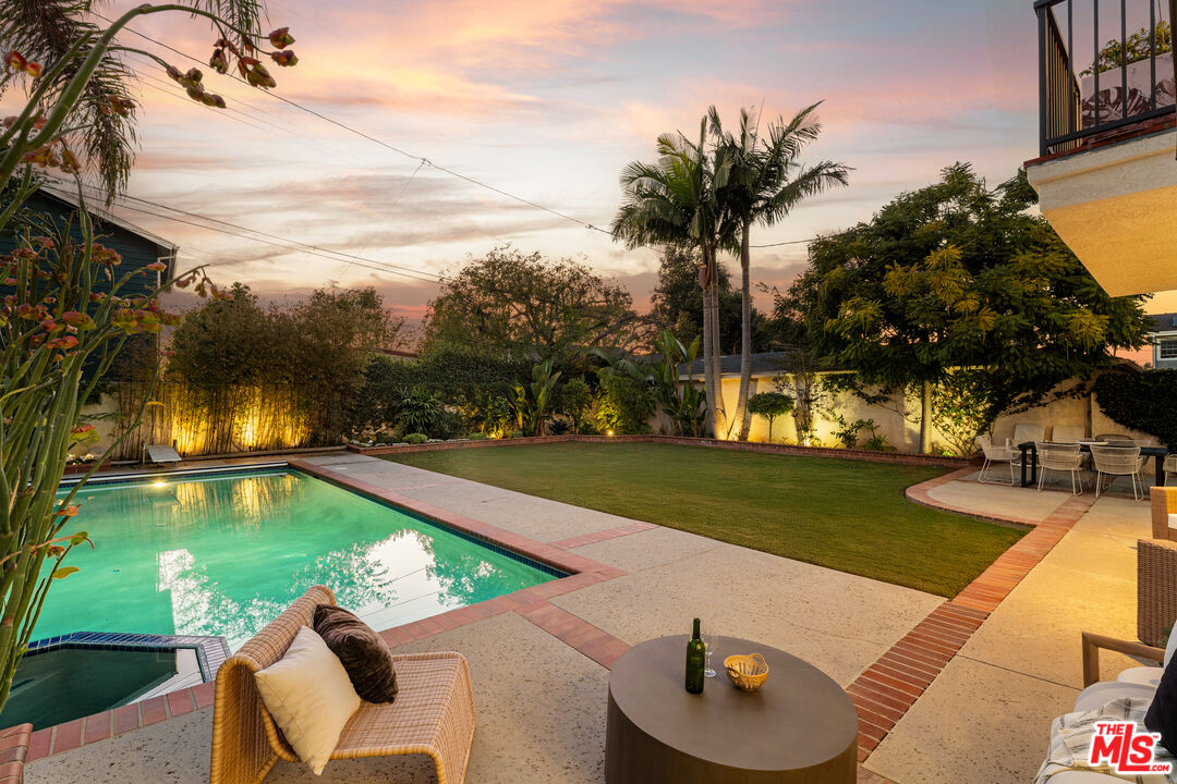 7825 Cowan Avenue Los Angeles, CA 90045 - Photo 33 of 33 a view of swimming pool with seating area and trees